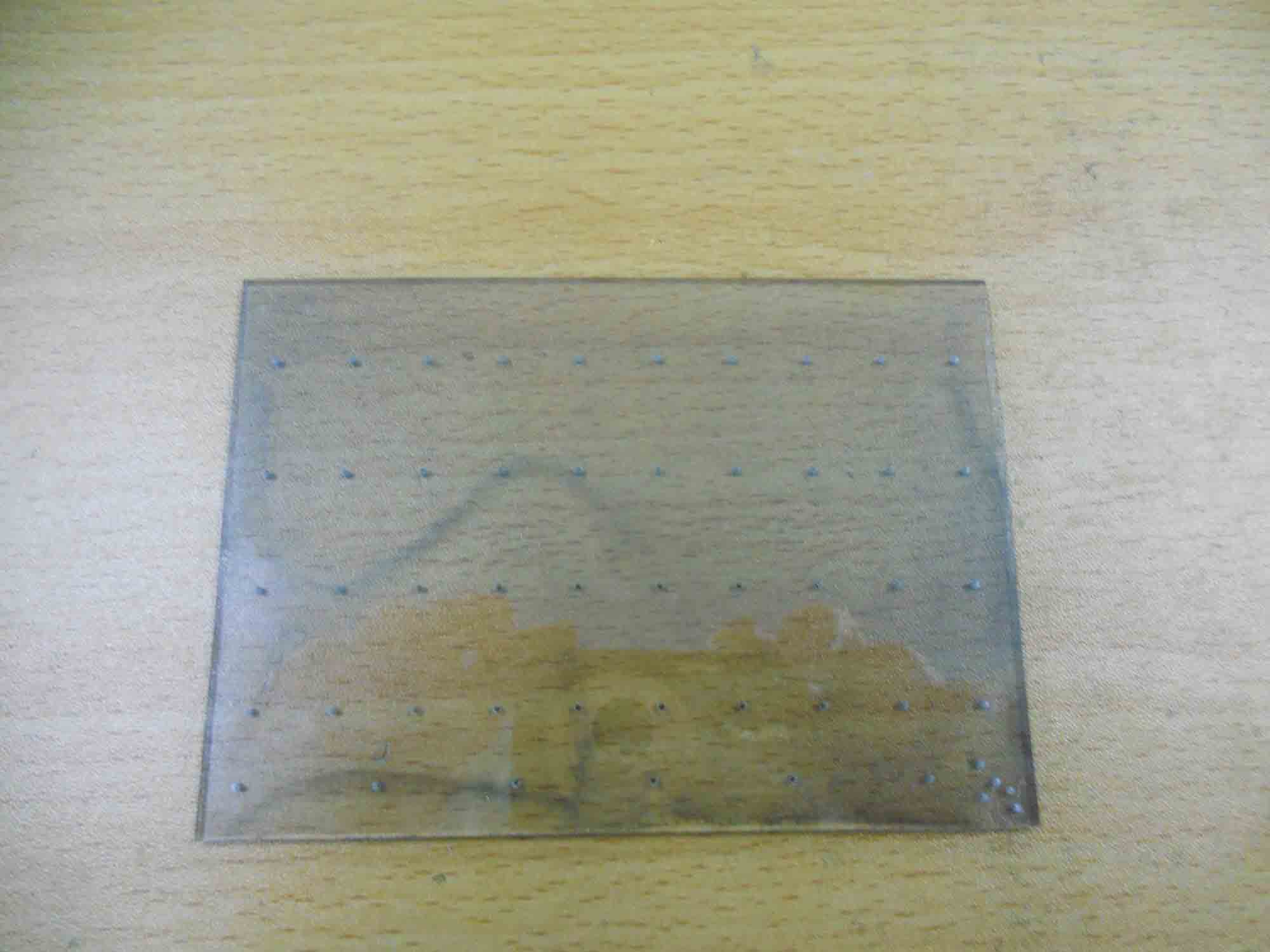 Conductive glass drilling